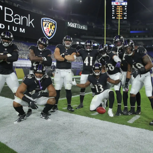Otaro playing with the Baltimore Ravens.
