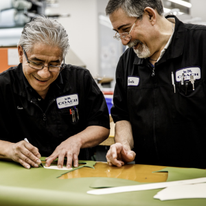 two people working together