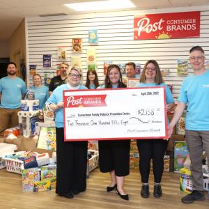 employees with a large check