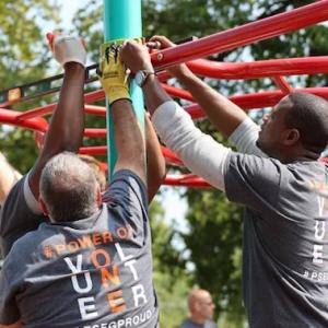 Volunteers building the playground.