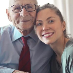 Elderly man shown with his daughter.