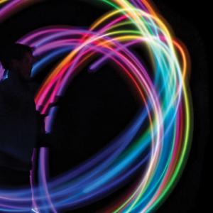 Diversity, Equality & Inclusion logo. Black background with circles in rainbow colors.