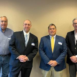 Photo of four graduates of the Supplier Diversity Mentorship Program.