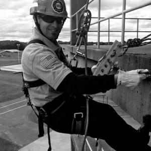 Photo: Delran Fire Chief Kevin Peak on a belay on a site.