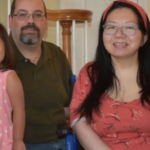 Jason and Julia with their daughter, Reina.