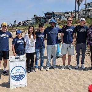 line of volunteers at the beach