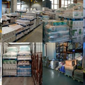 gallery of 8 images of stacks of pallets with water, boxes, and supplies