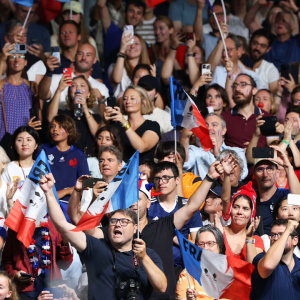 Crowd of people cheering