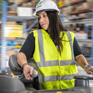 Wesco employee operating a forklift.