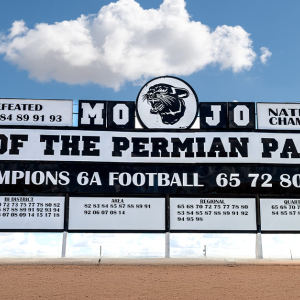 A large display "Home of the Permian Panthers" and dates of State Championships.