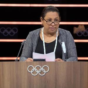 Person stood at a podium giving a speech