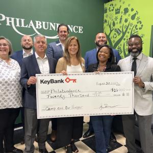 KeyBank presents a check in the amount of $20,000 to Philabundance Inc. From left to right: From left to right: Julie Vetack, Key@Work Relationship Manager, KeyBank; Robert Lombardo, Area Retail Leader, KeyBank; Jamie Tranfalia, Market President, KeyBank; Scott Fremont, Director of Individual Giving, Philabundance; Kristine DelMonte, Chief Development Officer, Philabundance; Juan Hurtado, Branch Manager, KeyBank; Loree D. Jones Brown, CEO Philabundance and Chiwuike Owunwanne, Corporate Responsibility Office