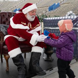Santa Claus was invited to Forest Hills Stadium's toy drive to help pass out presents.