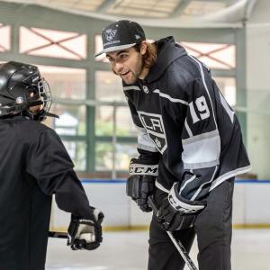 LA Kings Alex Iafallo talking to child during LA Kings “We Are All Kings” Rink Tour  