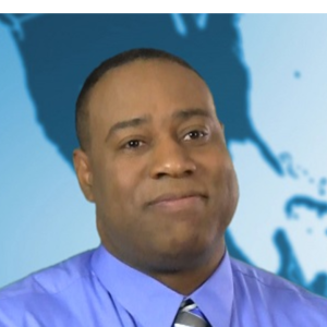 Headshot of a person against a blue background