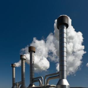 Image of geothermal installation venting out steam