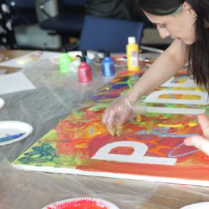 People make pride banner