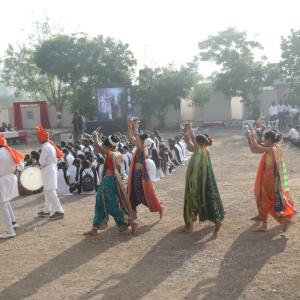 Group of people walking through a crowd