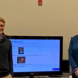 Students and faculty with a project