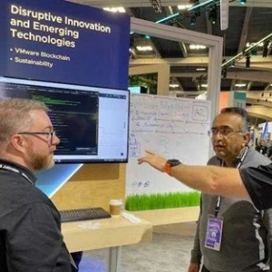 CEO Raghu Raghuram visits the company's Sustainability booth at the VMware Explore Expo