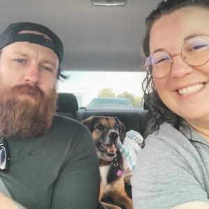Raisa Lynn, her husband and their dog.