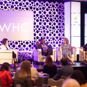 Panelists Traci Birch, Chuck Morse, Susannah Burley and Davie Breaux speak onstage