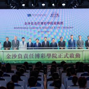 Group standing on stage under the words "Responsible Gaming Academy Kick-Off Ceremony"