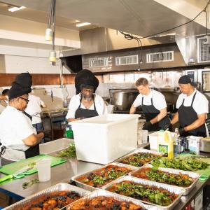 Food being prepared by Rethink Food chefs.