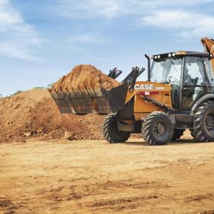 A construction vehicle hauling dirt