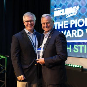 Southwire's Chief Supply Chain Officer, Charlie Murrah, presenting Southwire CEO Rich Stinson with the Pioneer Award
