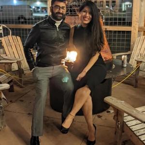 Richa Gandhi and her husband enjoying a night out.