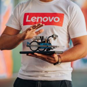 Person holding a robot