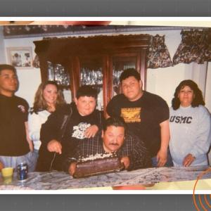 Roberto Barragan Jr. and his family shown at a birthday party. 