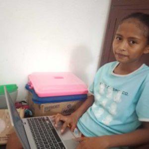 A child using a laptop