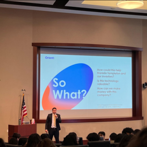 Person presenting to an auditorium