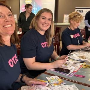 Otis colleague volunteers building STEAM kits