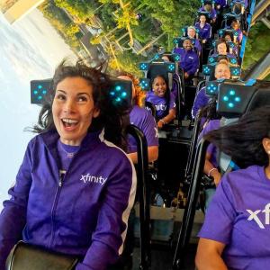 Students riding rollercoaster