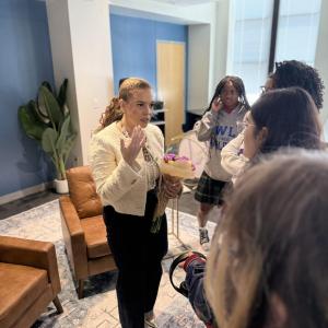 Carrissa Dowdy speaks to the Young Women’s Leadership Academy (YWLA) Girls Excelling in Math and Science (GEMS) group as part of their Women’s Empowerment Series