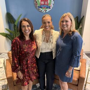Carrissa Dowdy and two others pose for a picture