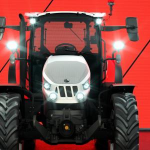 a tractor infront of a red backdrop at the 2024 German Design Awards