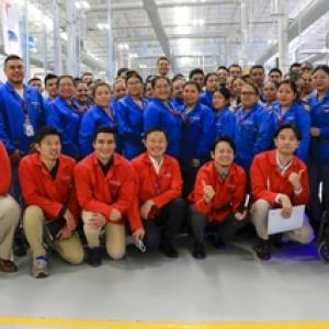 Subaru team members receiving their award.