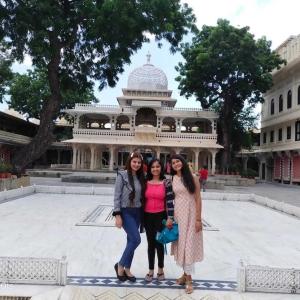 Sadbhavana Bhardwaj shown with her friends and family visiting a temple.