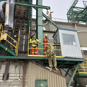 safety crew looking at a building