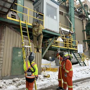 safety crew looking at a building