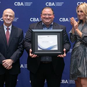 Mark Salatino receiving the Consumer Bankers Association Executive Banking School's top award.