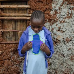 Girl holding sanitary pad