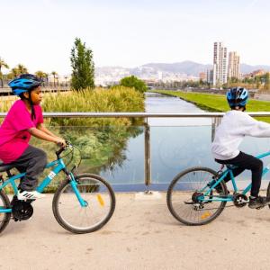 Biking students in a line
