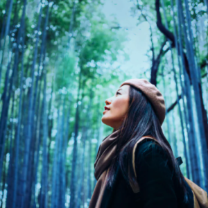 women looking around in woods