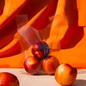 peaches in a compostable plastic bag made of seaweed