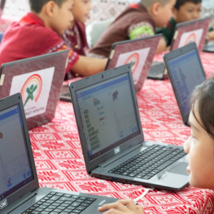 Children using laptops